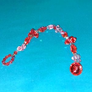 Swarovski Bracelet Beautiful  Colors  .Red and Pink